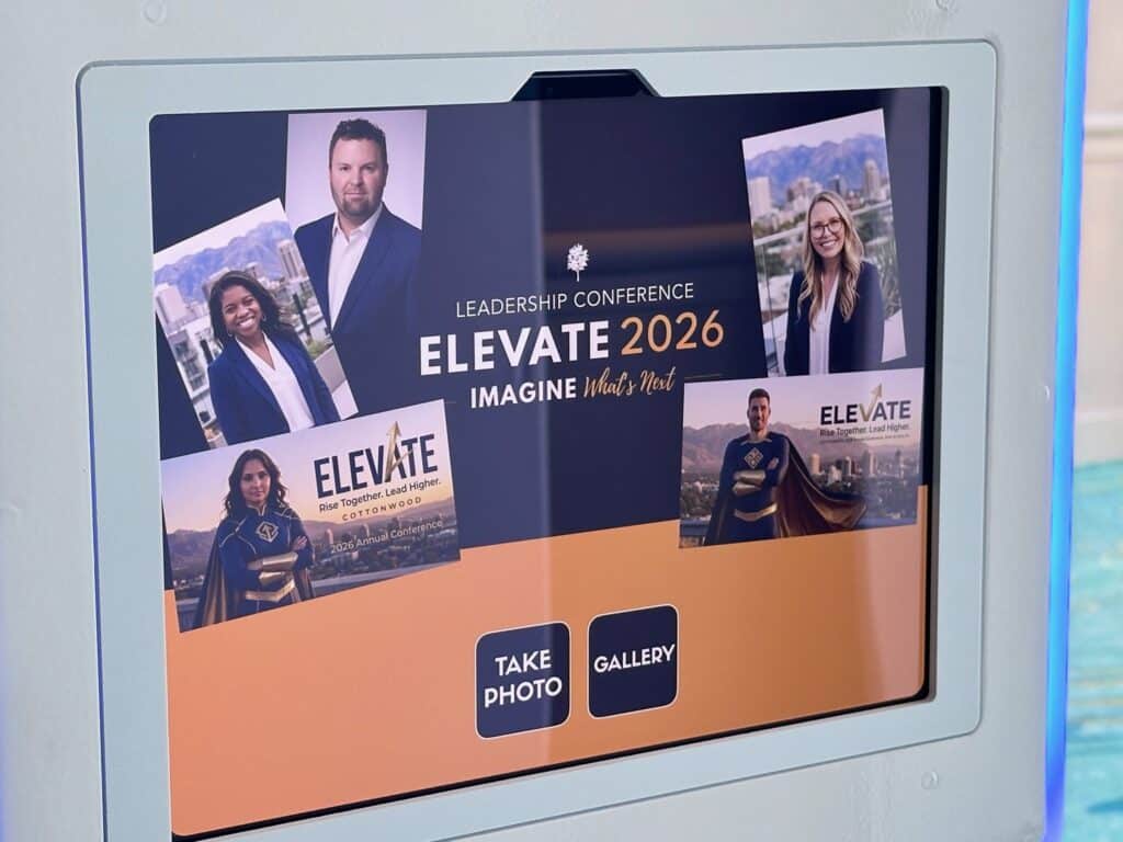AI photo booth start screen branded for the Elevate 2026 Leadership Conference with sample headshots